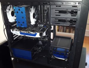 The Gemsbok PC with electric blue carbon fiber wrap - 5 Aesthetic Mods for your PC that DON’T Involve LEDs - no LEDs