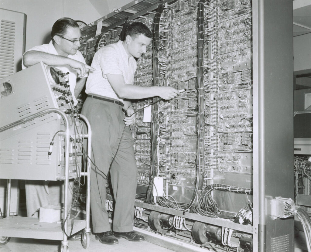 Census Bureau techs check out old computer frame